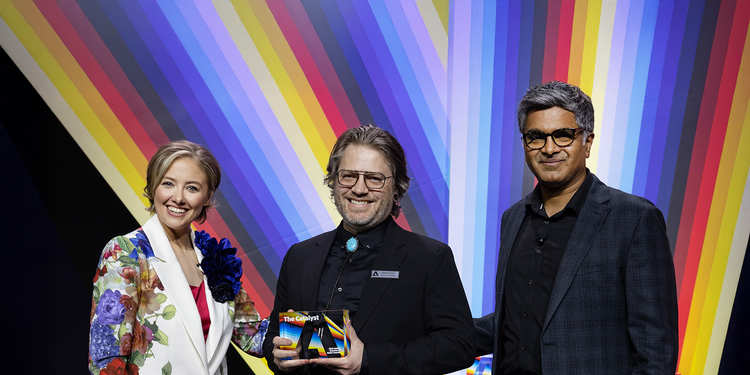 GM executives accepting “The Catalyst” award at the 2025 Adobe Experience Maker Awards.