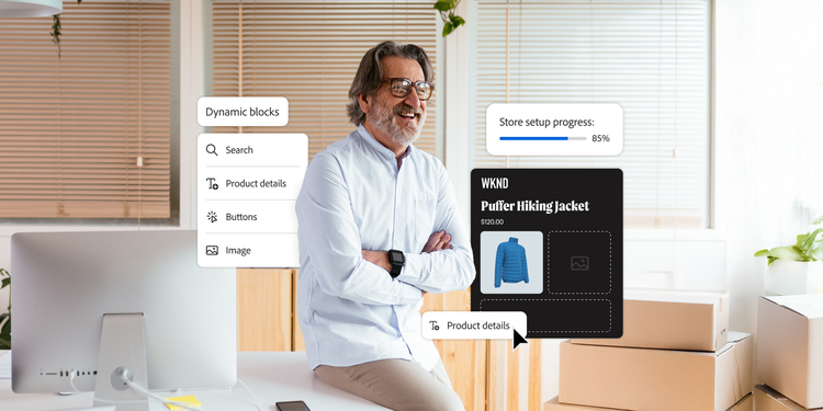 A man in glasses and a white shirt sits smiling in a modern workspace with boxes and a computer. Overlay elements display a store setup progress bar at 85%, a product card for a 'Puffer Hiking Jacket,' and a menu labeled 'Dynamic blocks' with options like Search, Product details, Buttons, and Image.