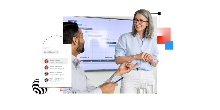 A woman speaks with a man about how to manage a project.