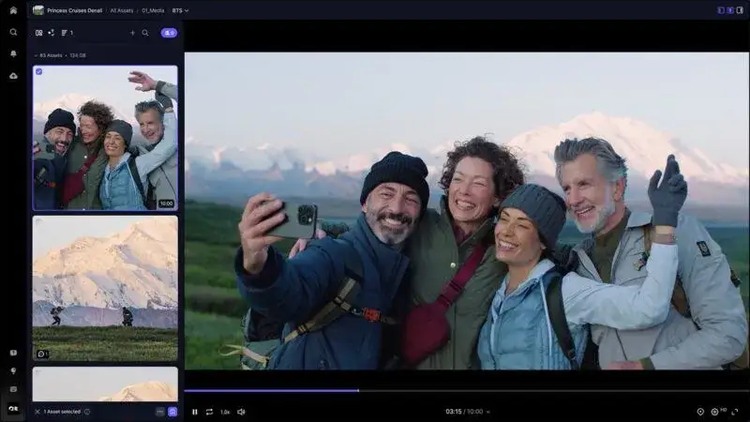 In Frame.io, a video segment under review shows four people using a phone to take a selfie in front a snowy distant mountain.