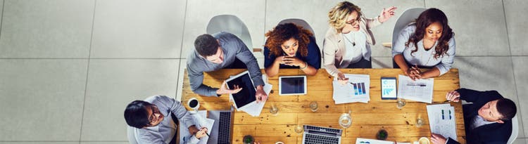 Ariel view of group of people at a business meeting