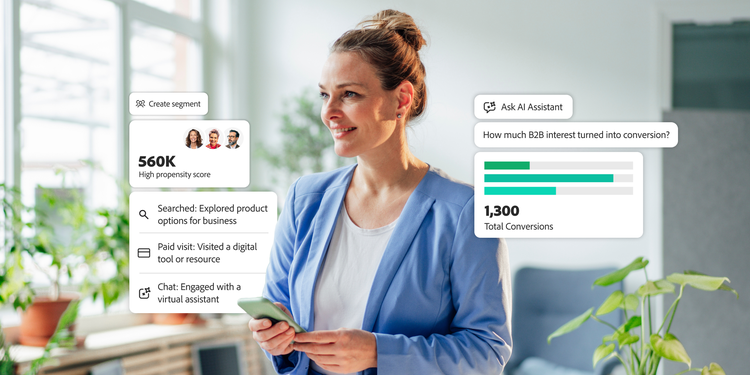 Spécialiste marketing B2B examinant des données sur le parcours d’achat de sa clientèle B2B à l’aide des applications Adobe.