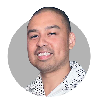 Headshot of Ephraim Gerard Cruz, the associate director of operations and software initiatives lead at Xfinity Creative.