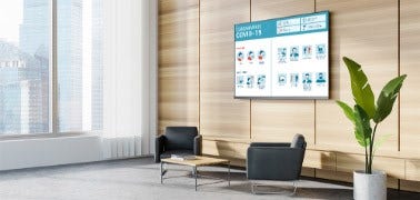 Schermo delle comunicazioni per il personale in un palazzo di uffici.