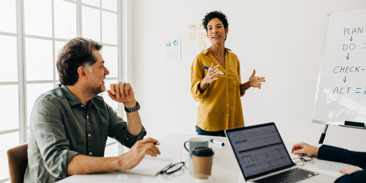 Professionals organizing a work breakdown structure