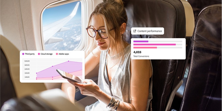 飛行機の窓際に座ってスマートフォンを見ている女性。