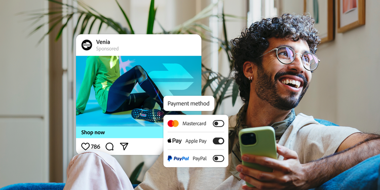 PayPal、Apple Pay、Mastercardなどの決済方法を使い、モバイルでショッピングをする男性。