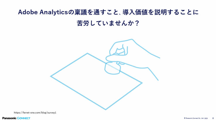 A hand holding a stamp Description automatically generated