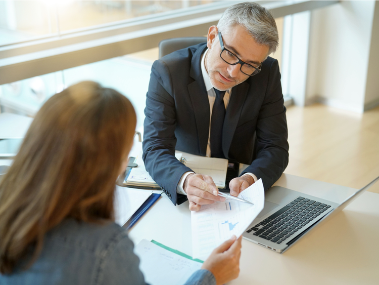 People reviewing documents in an office