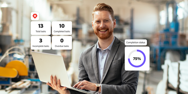 Smiling professional in a manufacturing setting with visual indicators showing task progress and team performance.