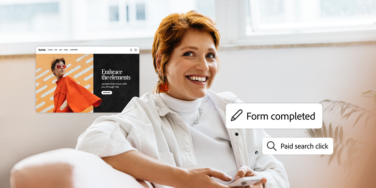 A marketer reviews campaign results on screen, with form completion and paid serach click data linked to the customer journey.